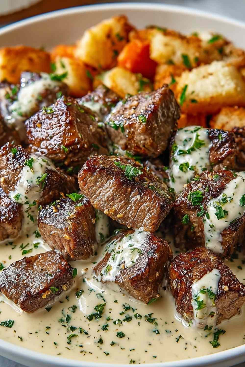 Garlic Butter Steak Bites with Parmesan Cream Sauce