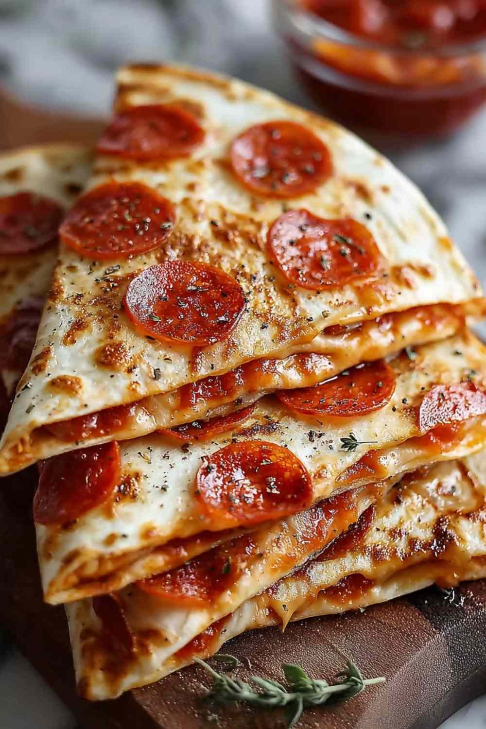 Golden Pepperoni Pizzadilla on Cutting Board.