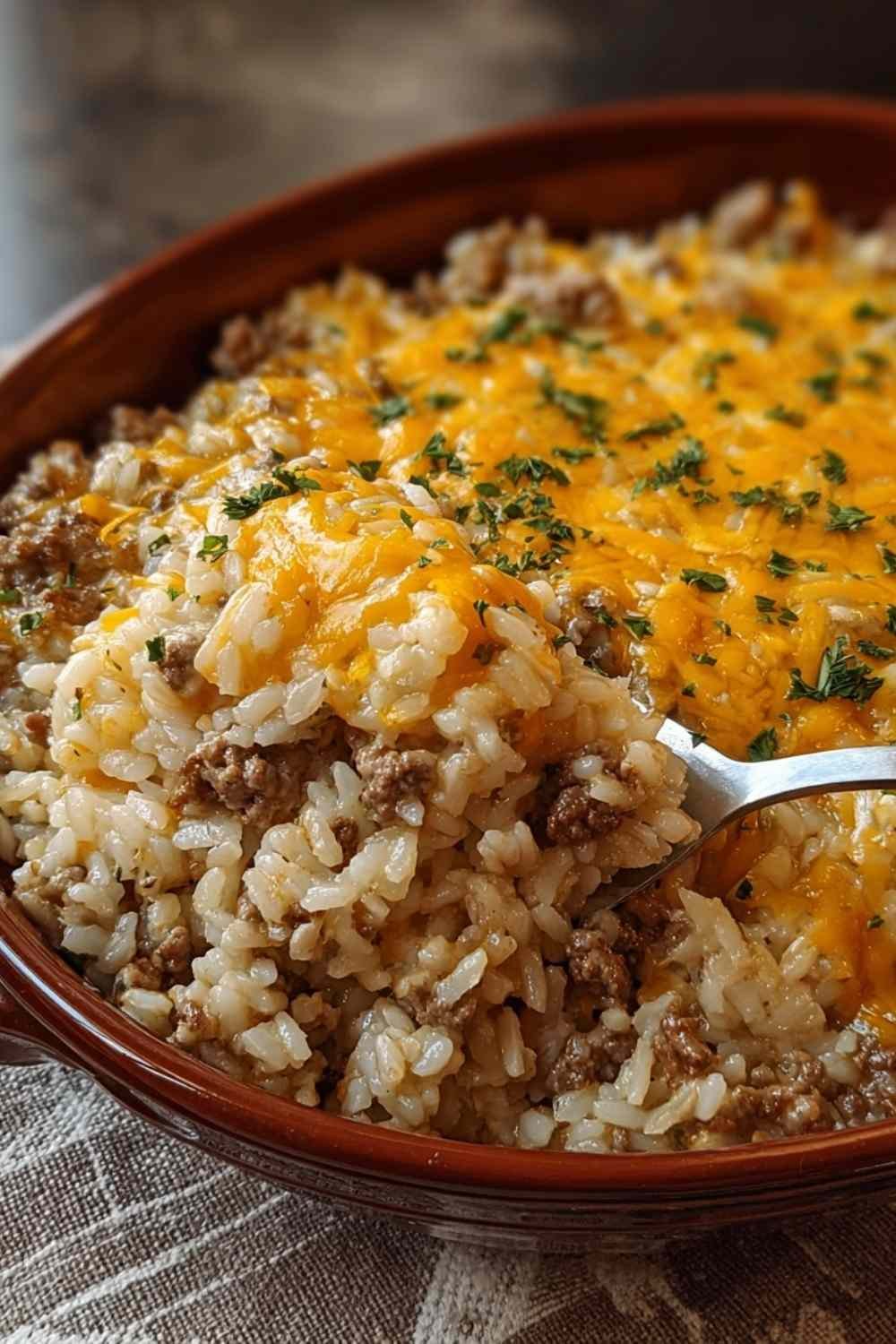 Homemade Cheesy Hamburger Rice Casserole in baking dish