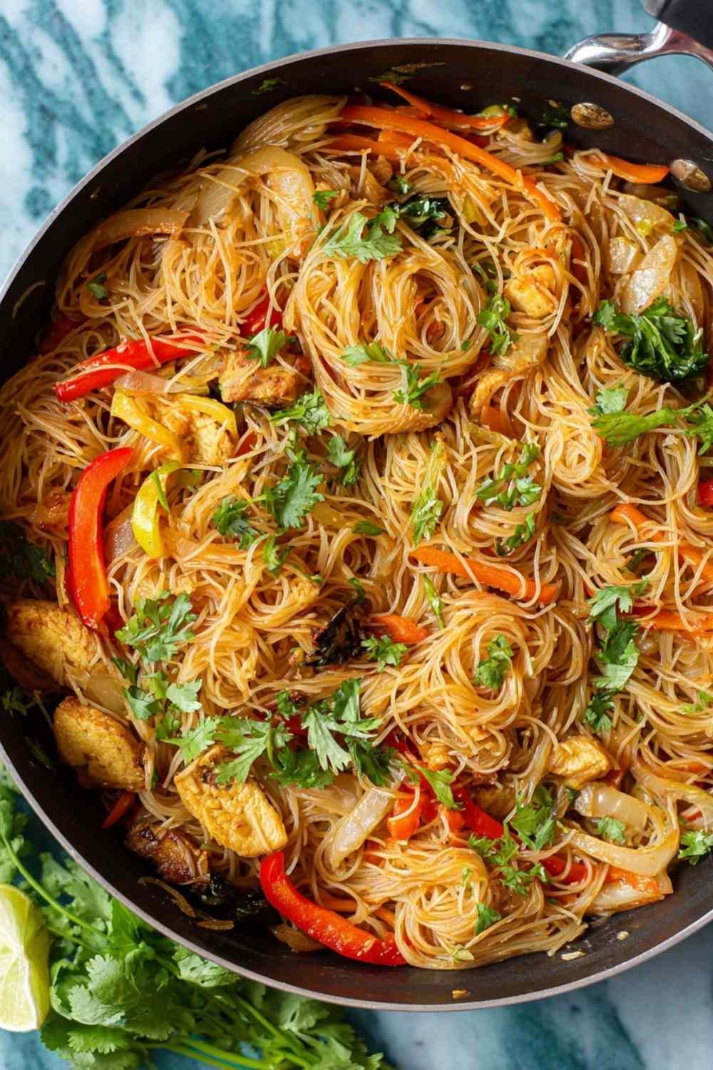 High protein chicken vermicelli noodles in white bowl with chopsticks showing tender chicken, vegetables, and garnishes
