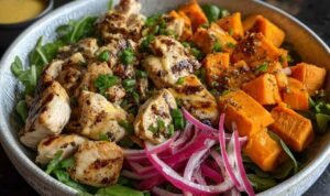 Maple Dijon Chicken Sweet Potato Bowls with glazed chicken, roasted sweet potatoes, and fresh spinach