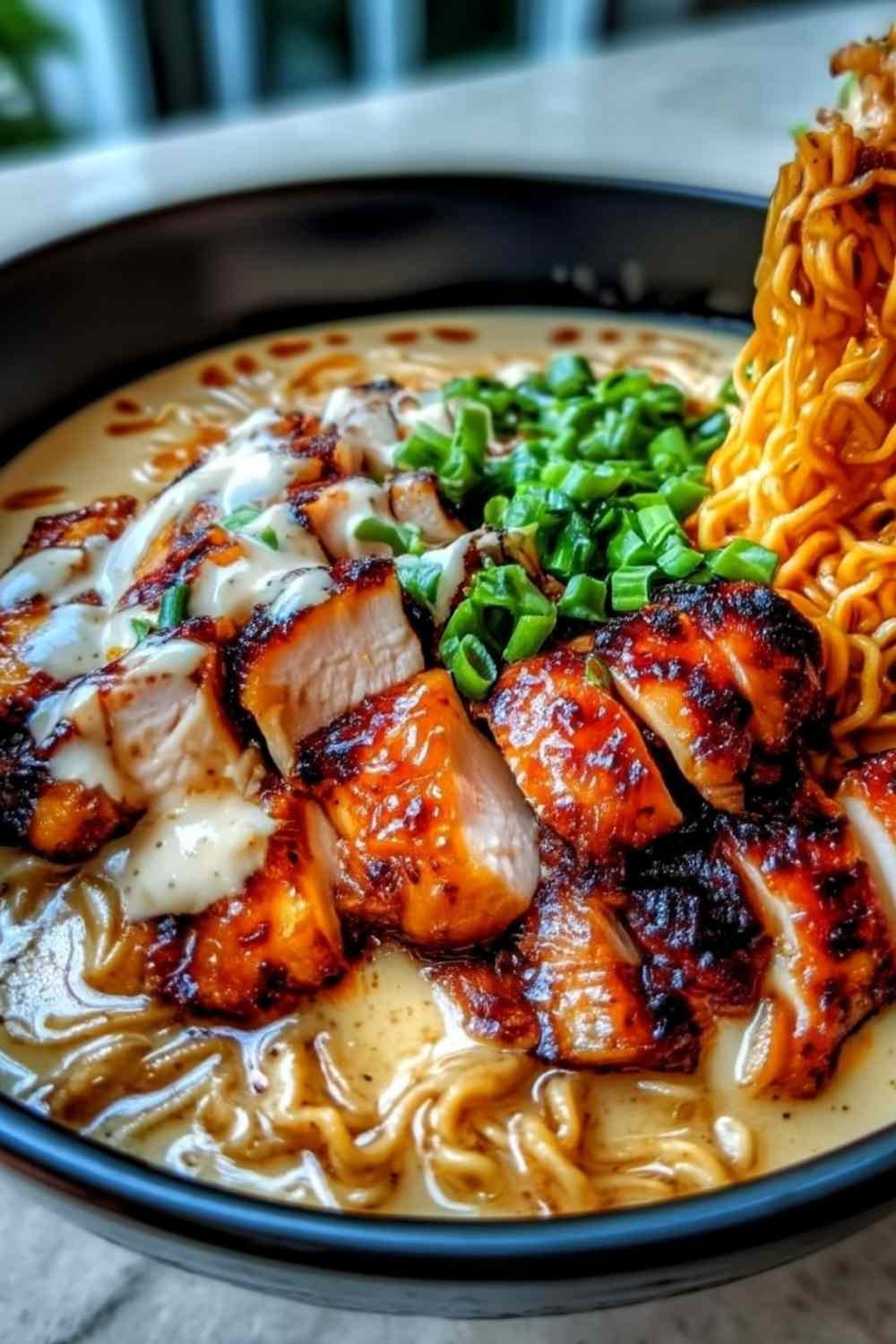 Fiery Chicken Ramen with Creamy Garlic Sauce in a Bowl