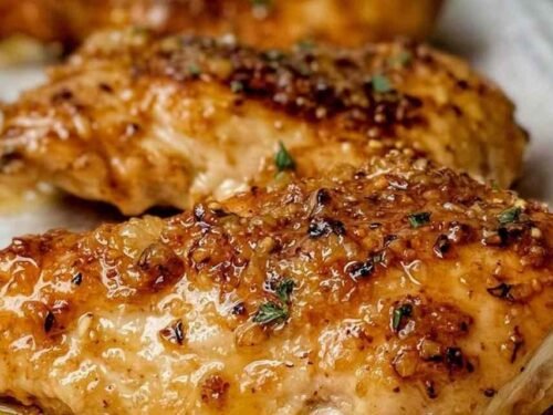 Juicy brown sugar garlic chicken with caramelized glaze in a casserole dish
