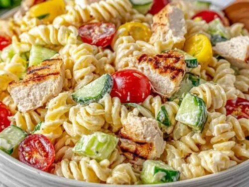 Chicken Club Pasta Salad with rotisserie chicken, crispy bacon, avocado, and cherry tomatoes in a creamy Italian-mayo dressing