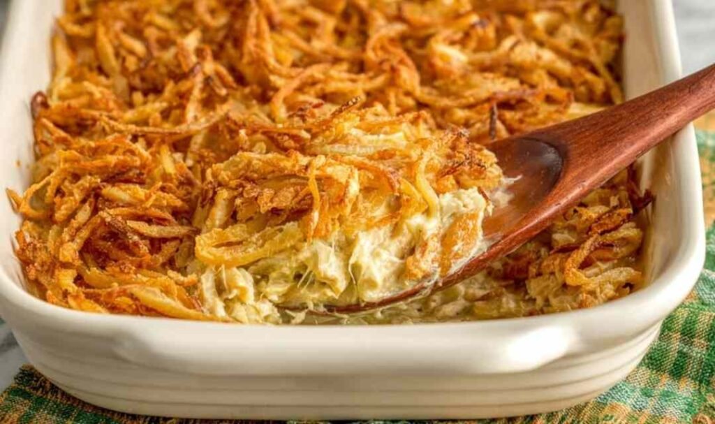 French onion chicken casserole in a 9x13 baking dish with golden crispy French fried onion topping fresh from the oven