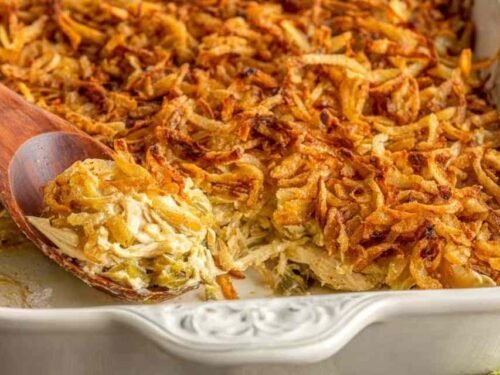 French onion chicken casserole in a 9x13 baking dish with golden crispy French fried onion topping fresh from the oven