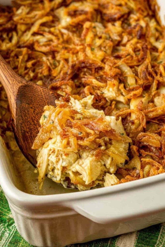 French onion chicken casserole in a 9x13 baking dish with golden crispy French fried onion topping fresh from the oven