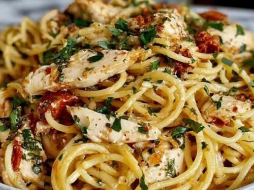 One-pan Monterey chicken spaghetti with melted Monterey Jack cheese and fresh parsley garnish