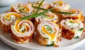 High protein bariatric chicken soup in a white bowl garnished with fresh parsley and a dollop of Greek yogurt