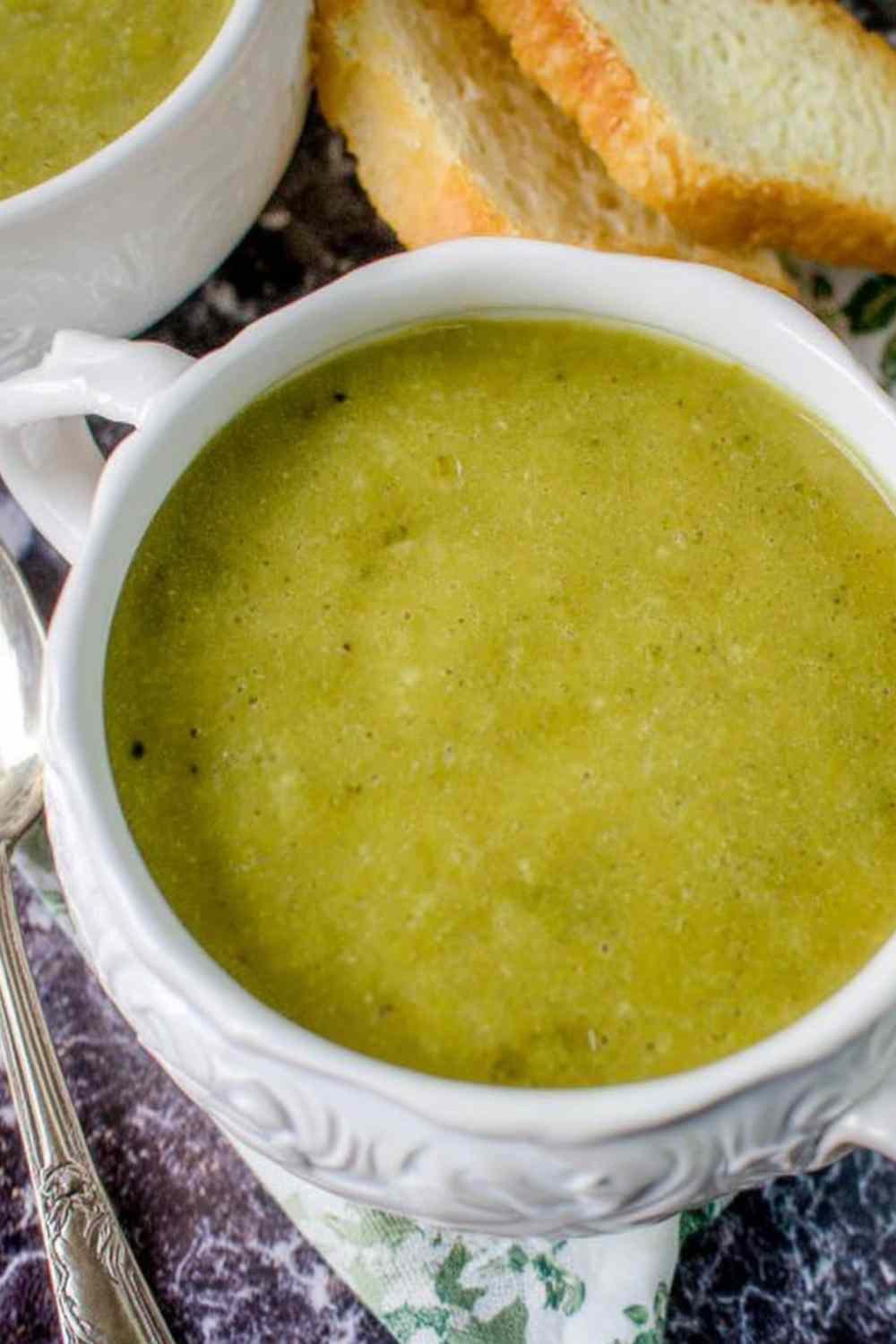 creamy-frozen-pea-soup-bowl-with-cream