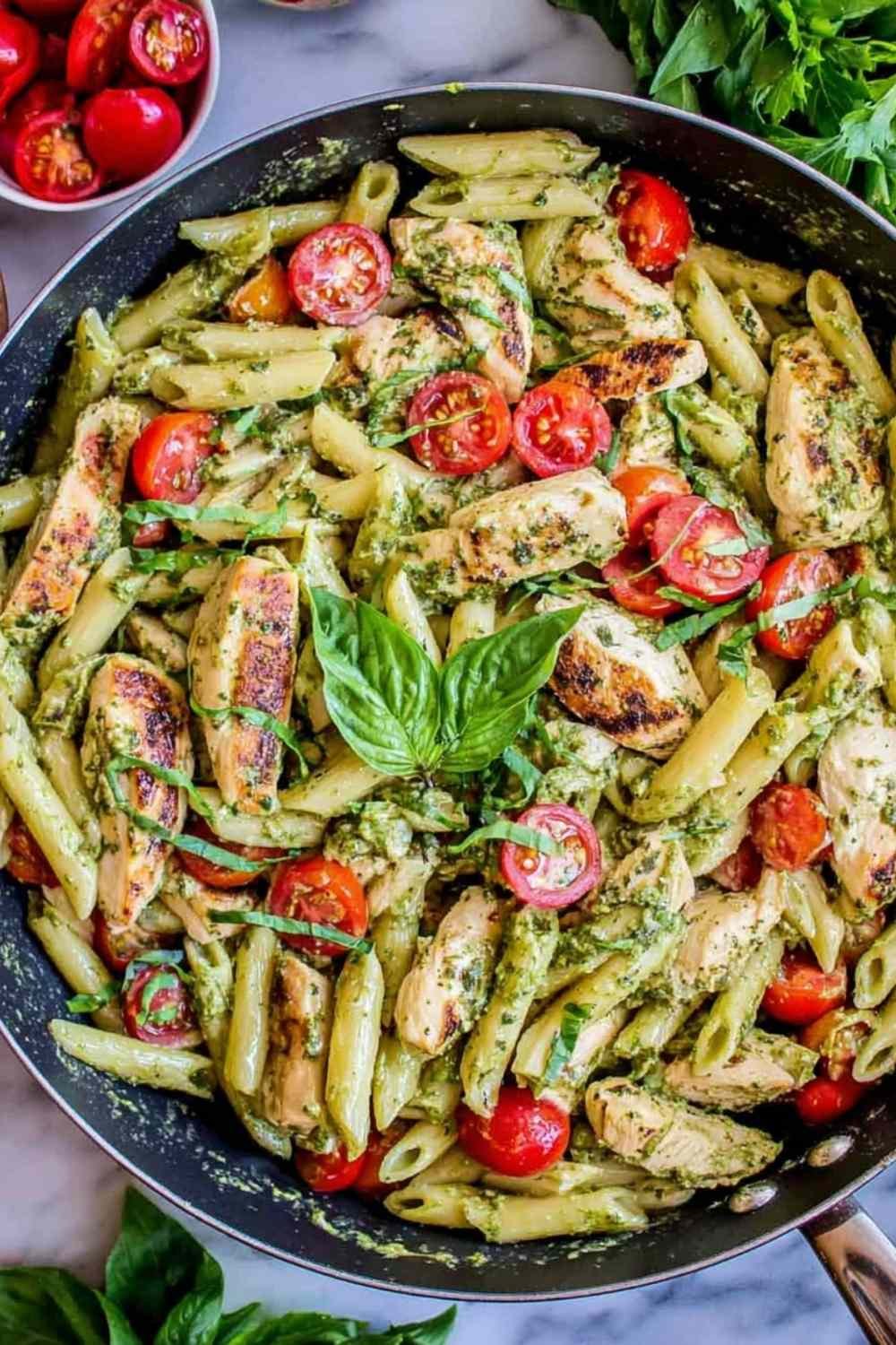 pesto-penne-with-chicken-cherry-tomatoes-white-bowl