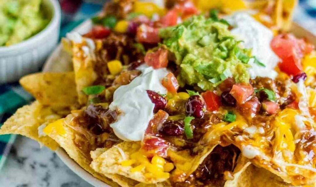 chili-nachos-loaded-bowl-queso-guacamole