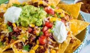 chili-nachos-loaded-bowl-queso-guacamole