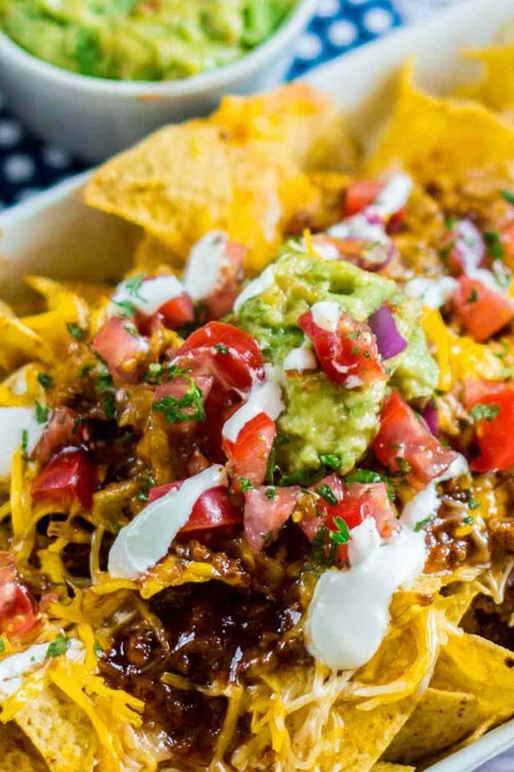 chili-nachos-loaded-bowl-queso-guacamole